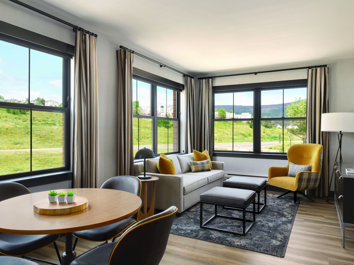 suite room with sofa and view