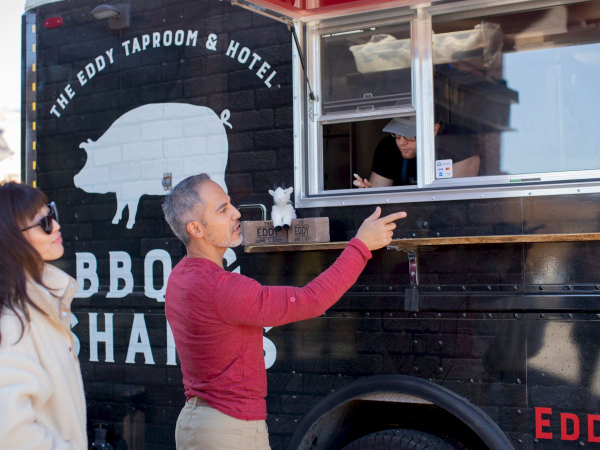 a man ordering from the eddy truck