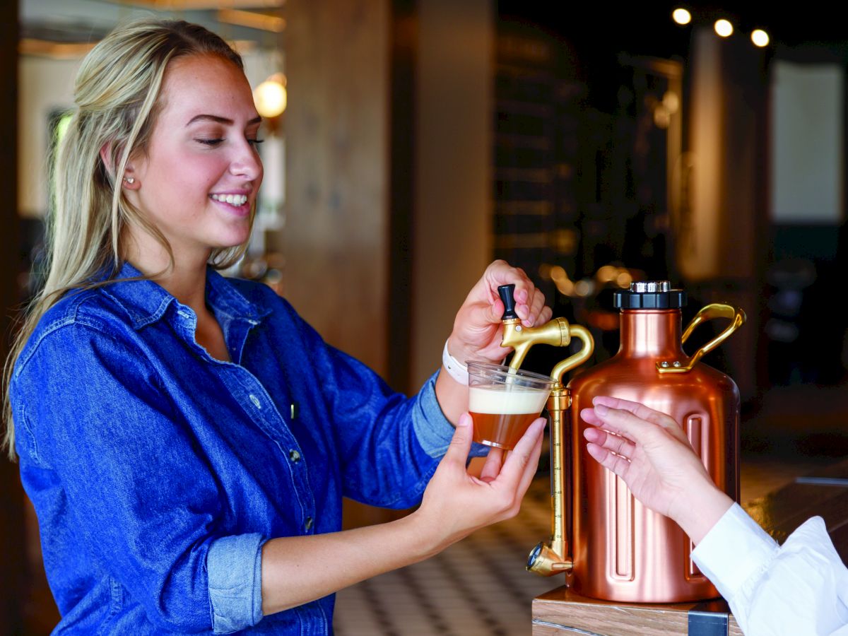 woman pouring drink