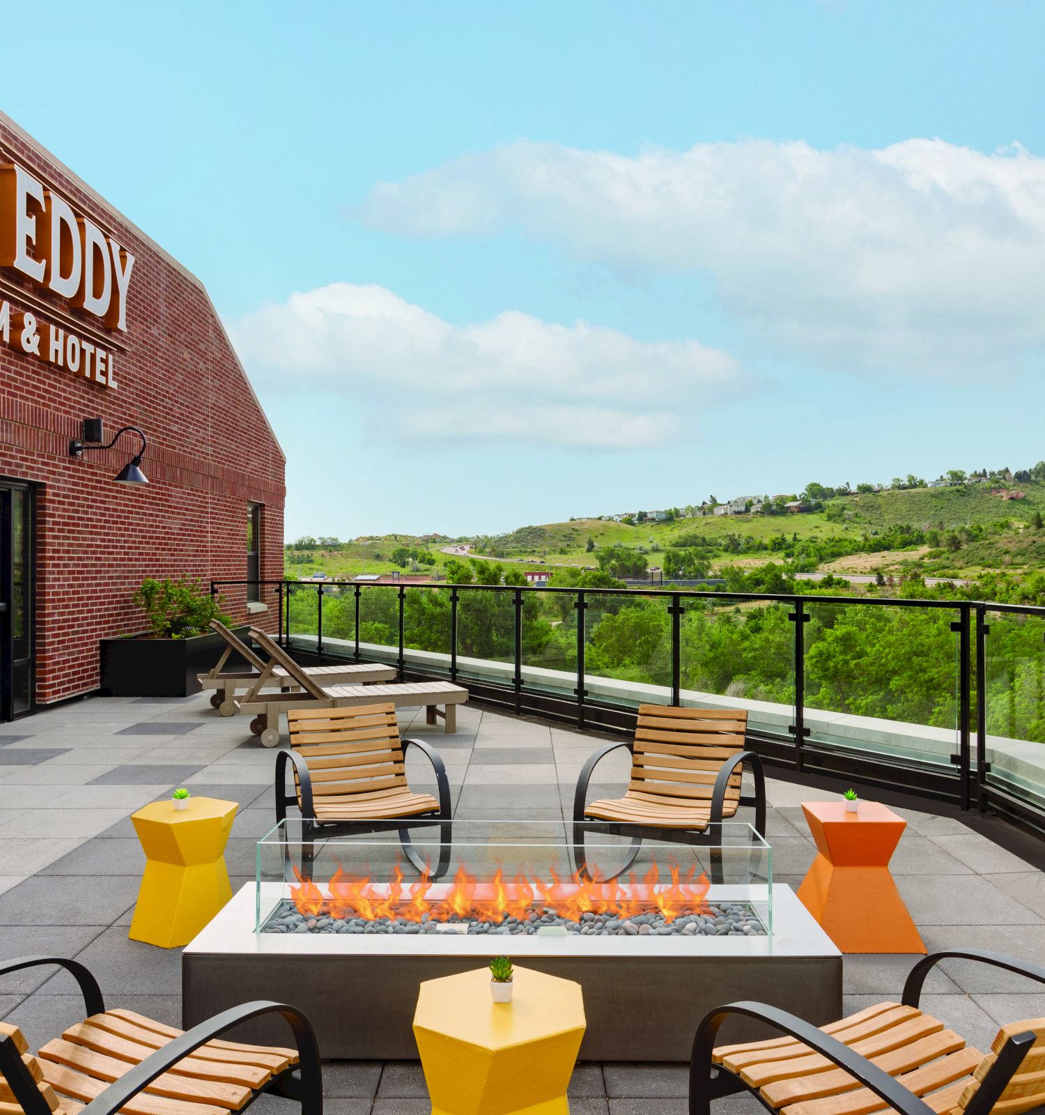 the eddy rooftop seating and fireplace