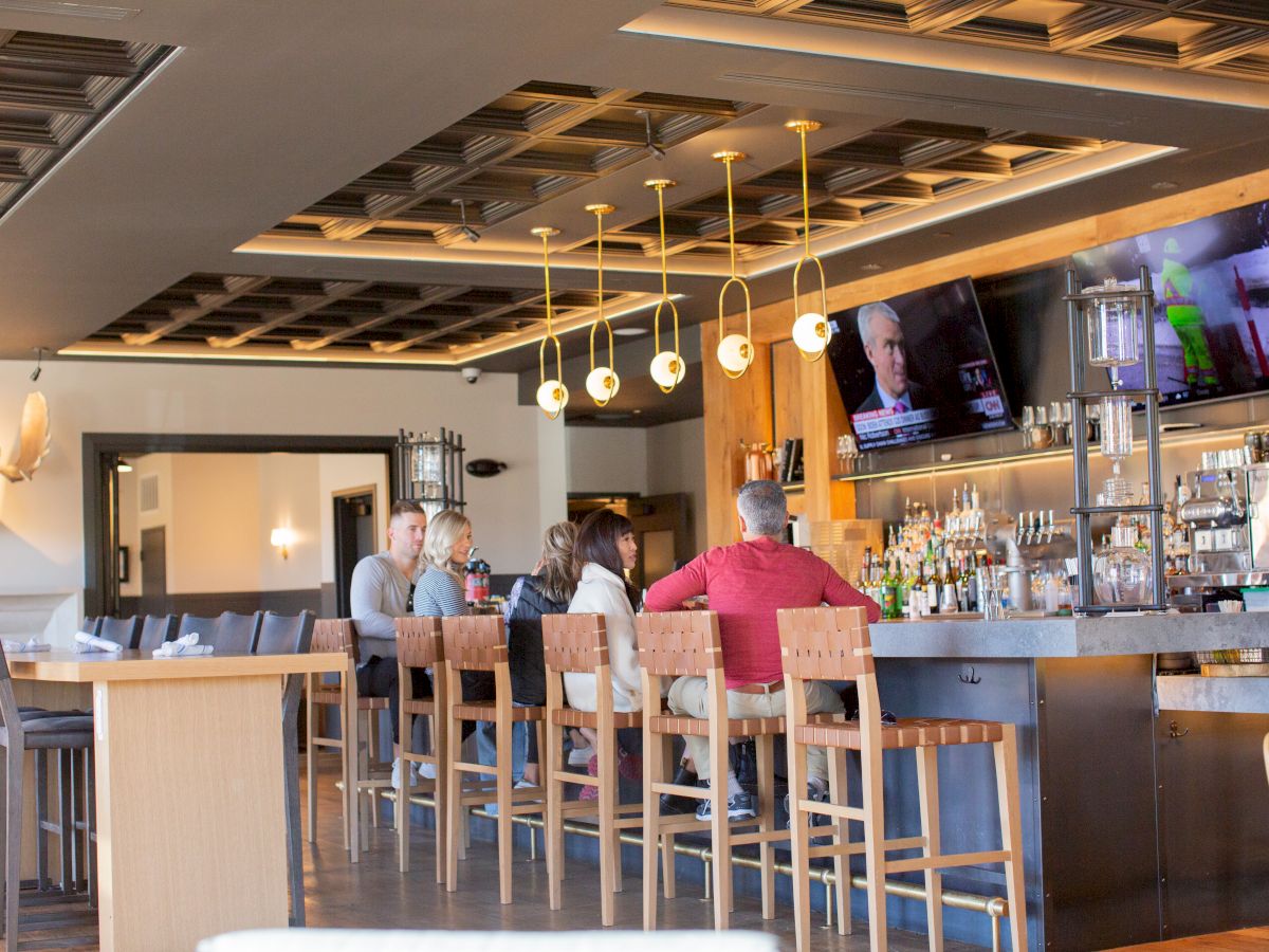people sitting at the bar