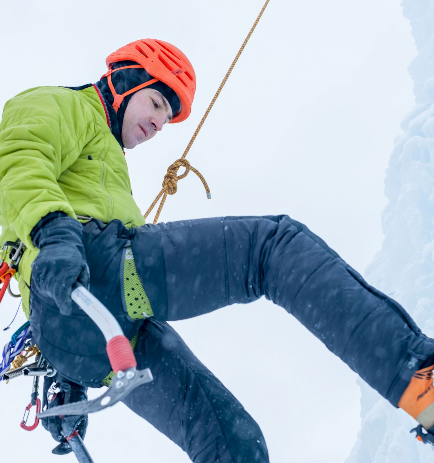 person ice climbing