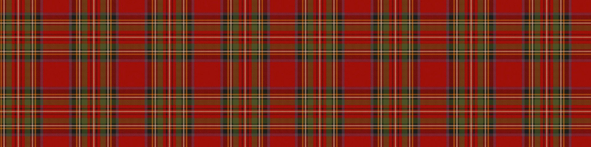 The image displays a red tartan plaid pattern with green and yellow lines crossing horizontally and vertically.