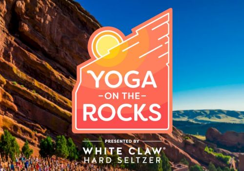 The image shows a "Yoga on the Rocks" event presented by White Claw Hard Seltzer, set against a scenic outdoor landscape.