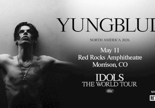 A grayscale concert poster for YUNGBLUD&rsquo;s North America 2026 tour, featuring a shirtless man arms outstretched, event details in the center and &ldquo;IDOLS THE WORLD TOUR&rdquo; at bottom.