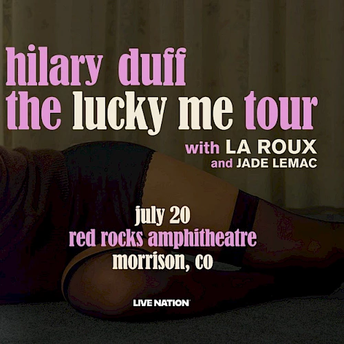 A promotional poster featuring Hilary Duff lying on a carpet, text about her &ldquo;The Lucky Me Tour&rdquo; with LA Roux and Jade LeMac; July 20 at Red Rocks Amphitheatre, Morrison, CO.