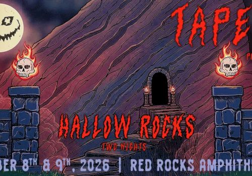 A spooky concert poster: orange flames, carved moon, skulls, a dark gate, and bold red text for &ldquo;Tape B&rdquo; and &ldquo;Hallow Rocks&rdquo; at Red Rocks Amphitheatre.