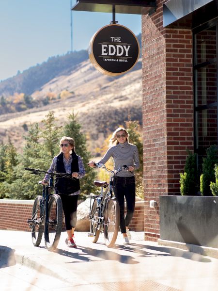 people walking bikes